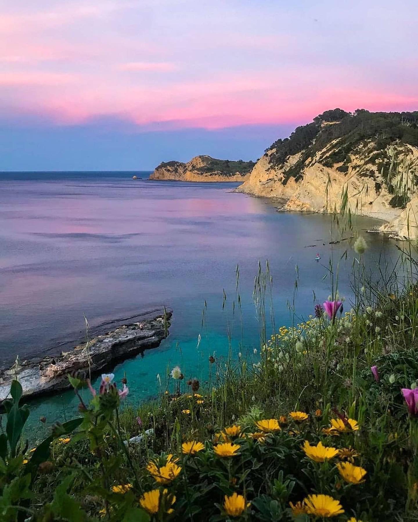Pink sunset over a Jávea cove