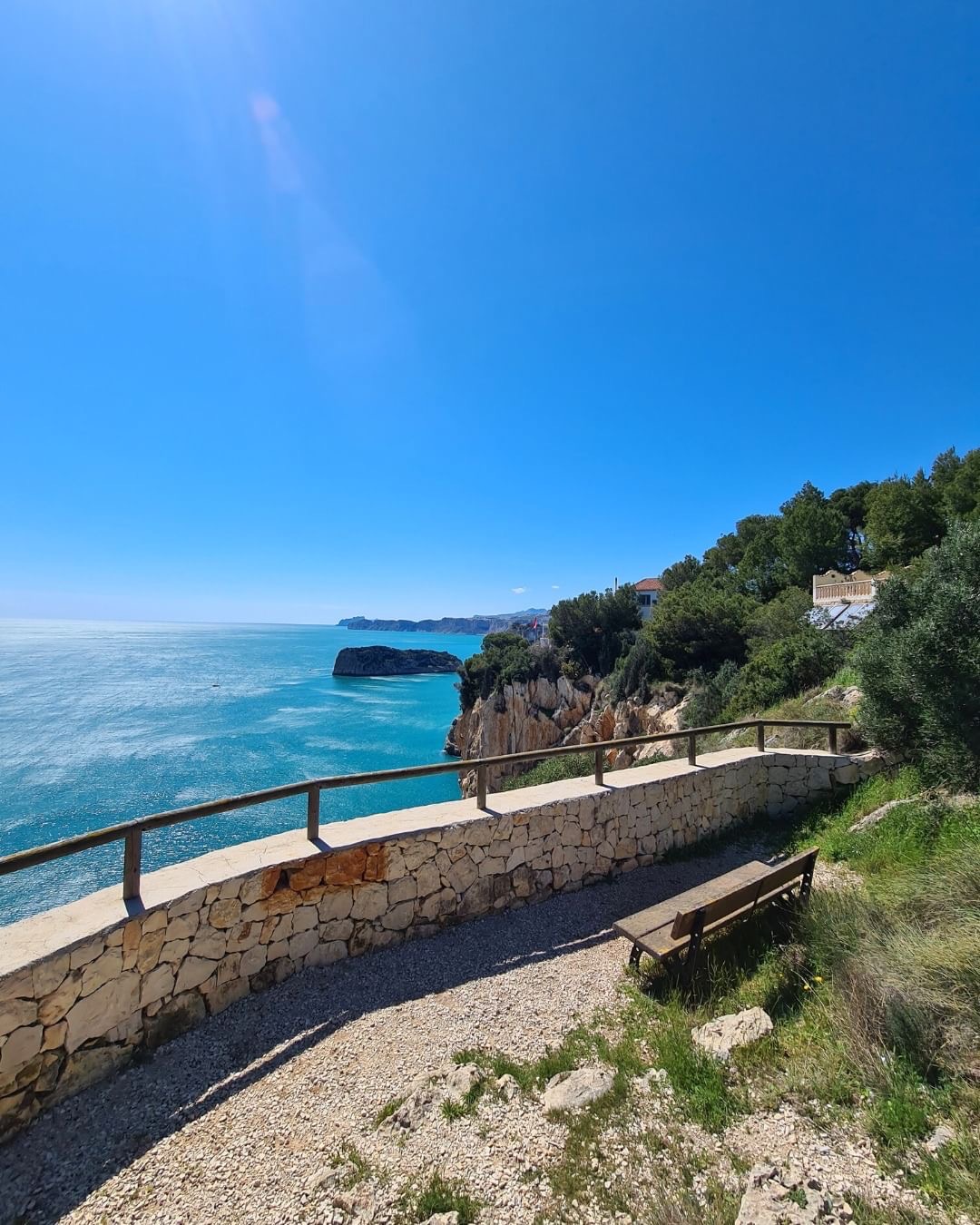 Bench at a viewpoint on Jávea's coastal promenade